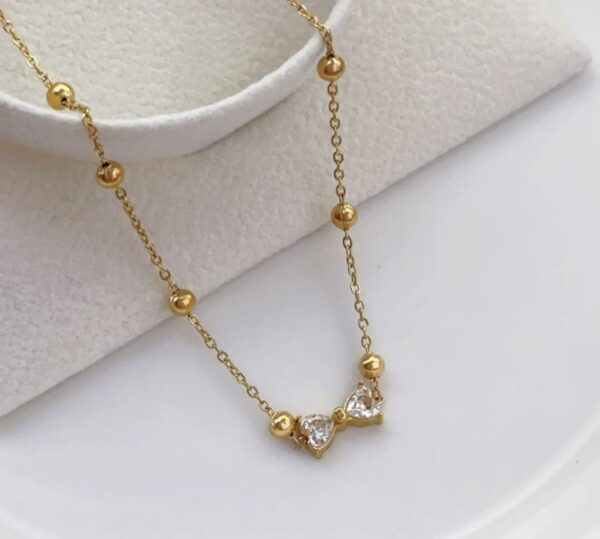 THE BLING KNOT - 18K gold plated minimalist bow neck piece