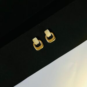 The Elegant Statement Makers - Golden Stud Earrings