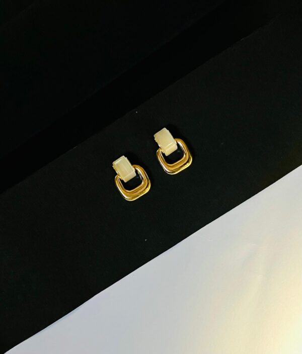 The Elegant Statement Makers - Golden Stud Earrings